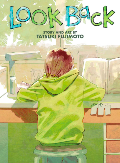 Manga drawing of girl in a bright green hoodie hunched over a desk, drawing. The girl is depicted with her back to the viewer.